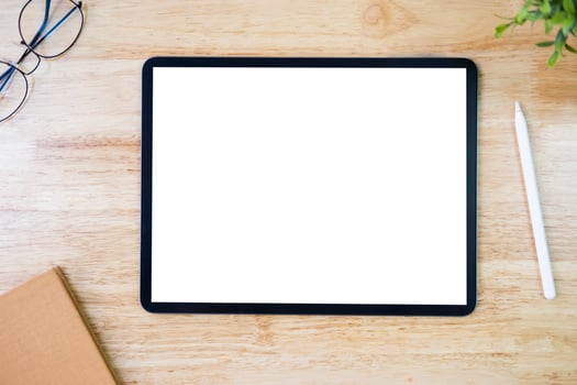Digital tablet mockup on office working table photo