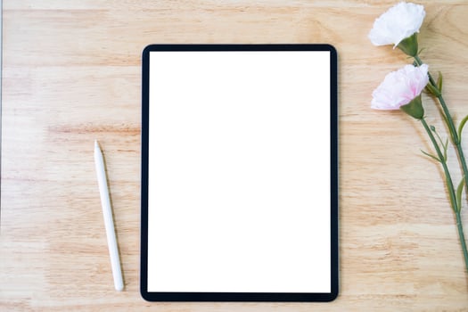 Digital tablet mockup on office working table photo