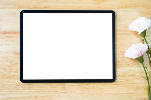Digital tablet mockup on office working table photo
