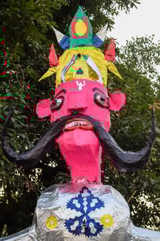 Ravnans being ignited during Dussera festival at ramleela ground in Delhi, India, Big statue of Ravana to get fire during the Fair of Dussera to celebrate the victory of truth by Lord Rama photo