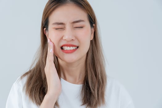 Asian woman feel toothache from gingivitis, female suffer tooth, decay problems, dental care. sensitive tooth, decay problem, bad breath, Gingival Recession, Oral Hygiene instruction, tooth extraction photo