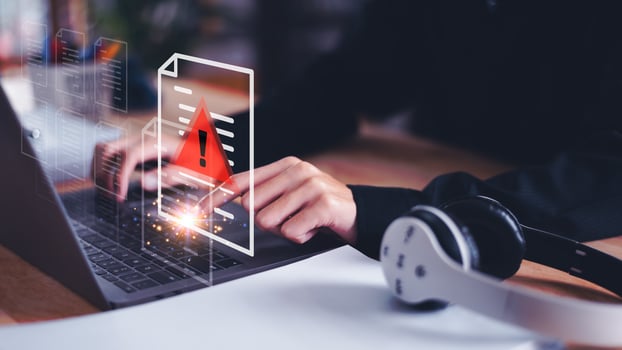 Programmer and virtual icons , exclamation mark ,alarm,computer virus detected ,danger warning concept or information error that should be urgently fixed and repaired ,Notification of security issues photo