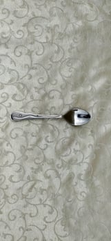 Kitchen spoon with chrome color from metal photo