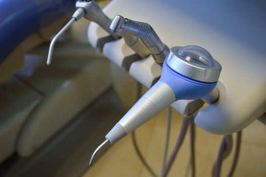 Dental instruments and drill, in dentists office, dental care. photo