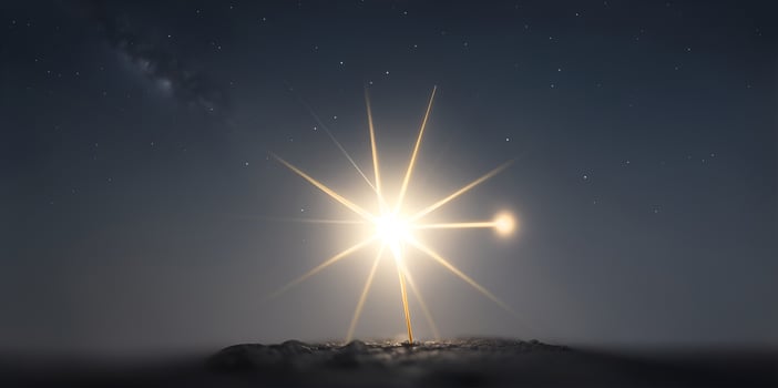 A single star receiving light from above. One standing star. Shallow depth of field. photo