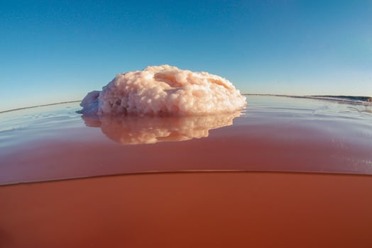 a large white object floating in a body of water photo
