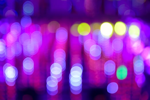 a blurry image of a purple and blue light photo