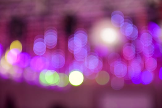 a blurry image of a colorful light show photo