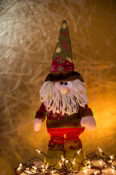 a stuffed gnome with a beard and a red hat photo
