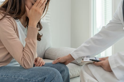 woman with mental health problems is consulting. psychiatrist is recording the patient's condition for treatment. encouragement, love and family problem, bipolar , depression patient, protect suicide photo