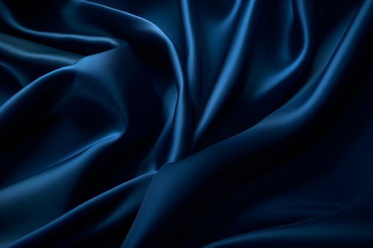 Smooth elegant dark blue silk or satin luxury cloth texture can use as abstract background. Luxurious background design. photo