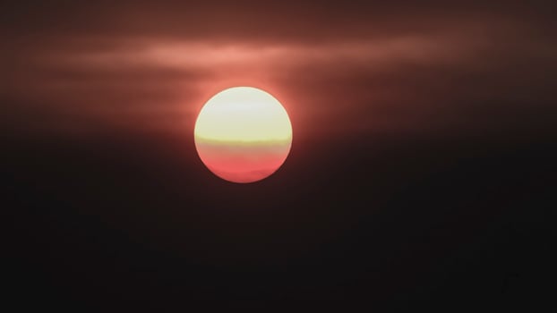 Orange sunset with clouds. photo
