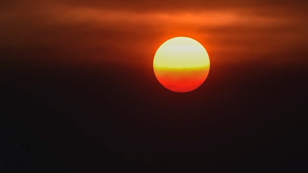 Orange sunset with clouds. photo