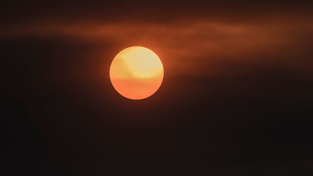 Orange sunset with clouds. photo