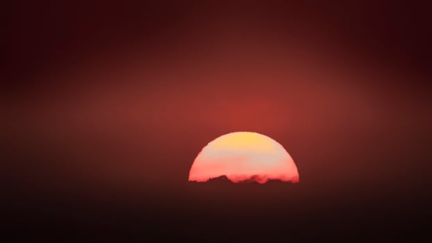 Orange sunset with clouds. photo