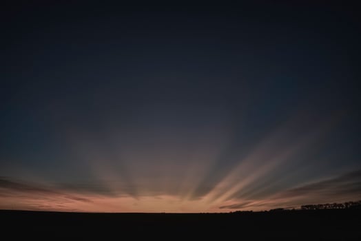 Sunbeams at sunset, Patagonia , Argentina photo