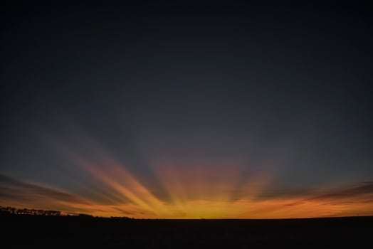 Sunbeams at sunset, Patagonia , Argentina photo