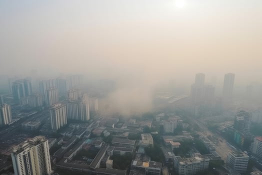 Sky view. Air quality in many cities around the world is dangerously low, causing serious health problems for the people who live there. photo