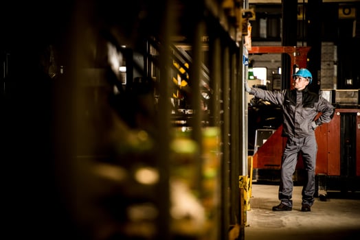 Caucasian Warehouse worker with blue Safety Helmet photo