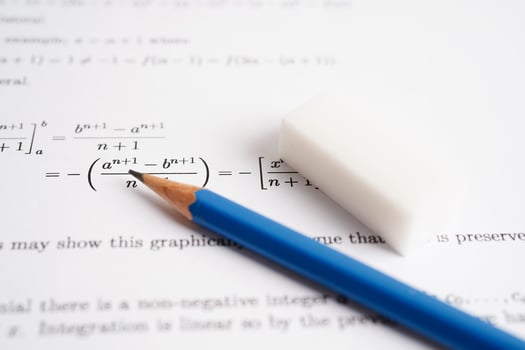 Pencil on mathematic formula exercise test paper in education school. photo