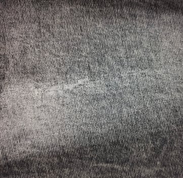 Stone wash grey jeans denim fabric close up photography, denim jeans cloth, denim texture, indigo photo