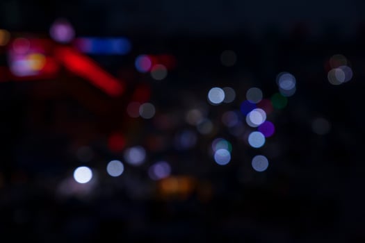 Colorful Defocus Abstract bokeh street lights effects on the night black background texture photo