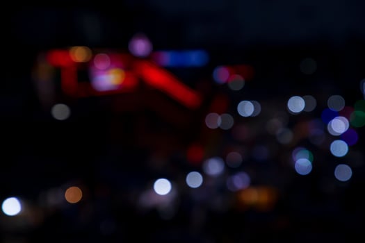 Colorful Defocus Abstract bokeh street lights effects on the night black background texture photo
