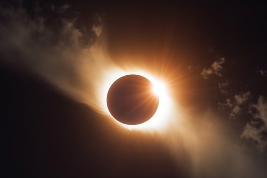 Enigmatic eclipse, Clouds shroud the celestial event, sun flare breaks through photo