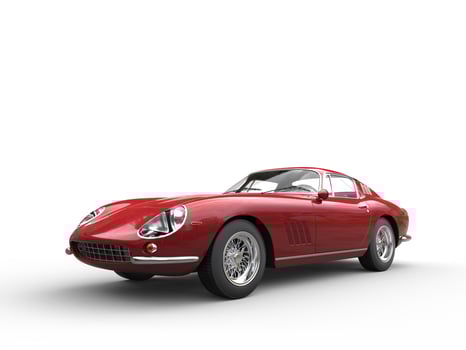 Dark red classic sports car - isolated on white background photo