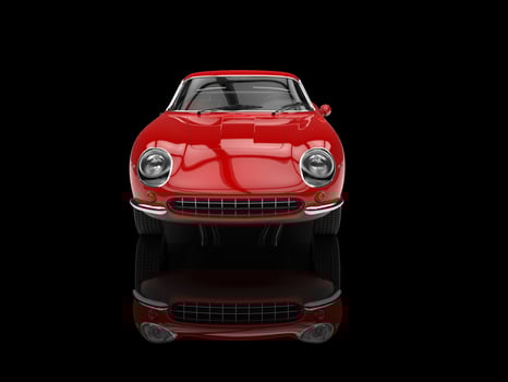Red classic sports car - front view - isolated on black reflective background photo