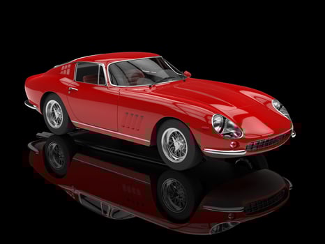 Red classic sports car - black studio shot with ground reflections photo