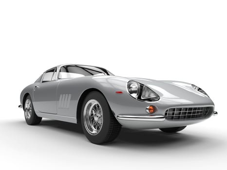 Vintage sports car - metallic paint - closeup shot - isolated on white background photo