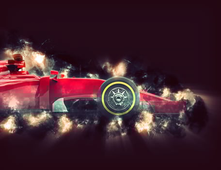 Front wheel of formula one car - isolated on white background. photo