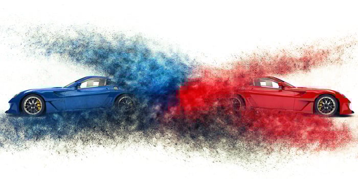 Red and blue awesome sports cars - particle explosion photo