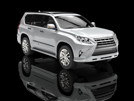 Modern urban silver SUV - in black showroom photo