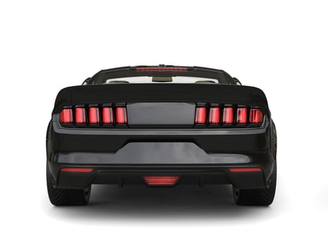 Black shiny new urban muscle car - back view photo