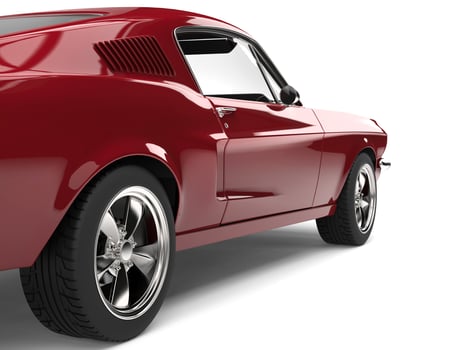 Amazing American vintage muscle car - cherry red - rear wheel closeup shot photo