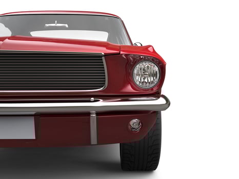 Amazing American vintage muscle car - cherry red - front view closeup cut shot photo