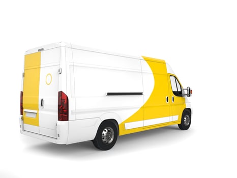 Big white and yellow delivey van - tail view photo