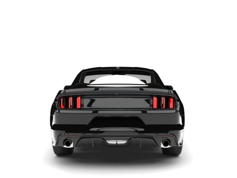 Crushing black modern sports muscle car - back view photo