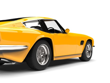 Bright yellow vintage fast car - rear wheel closeup shot photo