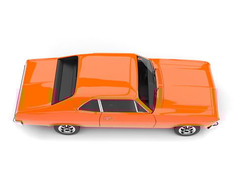 Bright orange restored vintage muscle car - top down view photo