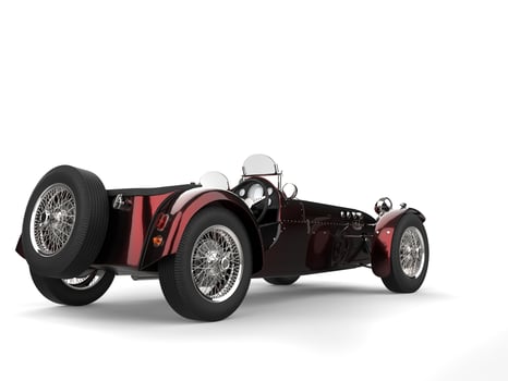 Metallic deep red vintage open wheel sport racing car - back view photo