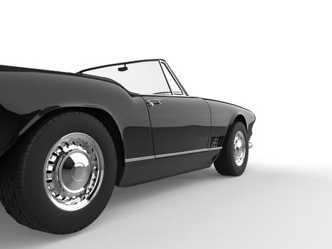 Beautiful Black restored vintage cabriolet car - rear wheel closeup shot photo