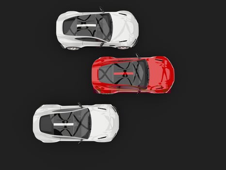 Modern sports cars racing - red leading the way photo