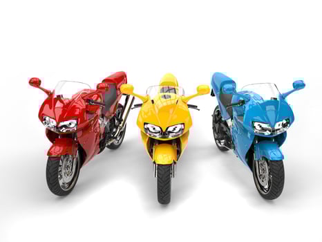 Red, yellow and blue modern super sports bikes - top front view photo