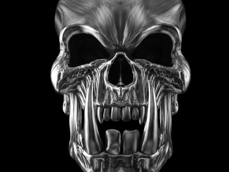 Demon orc skull with big sharp tusks - closeup shot photo
