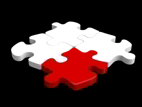 Four piece puzzle set with one red piece - focus on the red piece photo