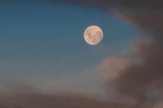 Moon in a sky with clouds,Patagonia Argentina photo
