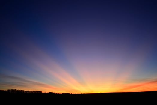 Sunbeams at sunset, Patagonia , Argentina photo